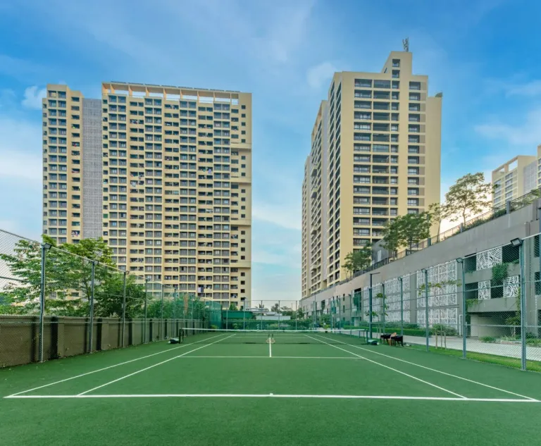 Tennis court between two residential towers